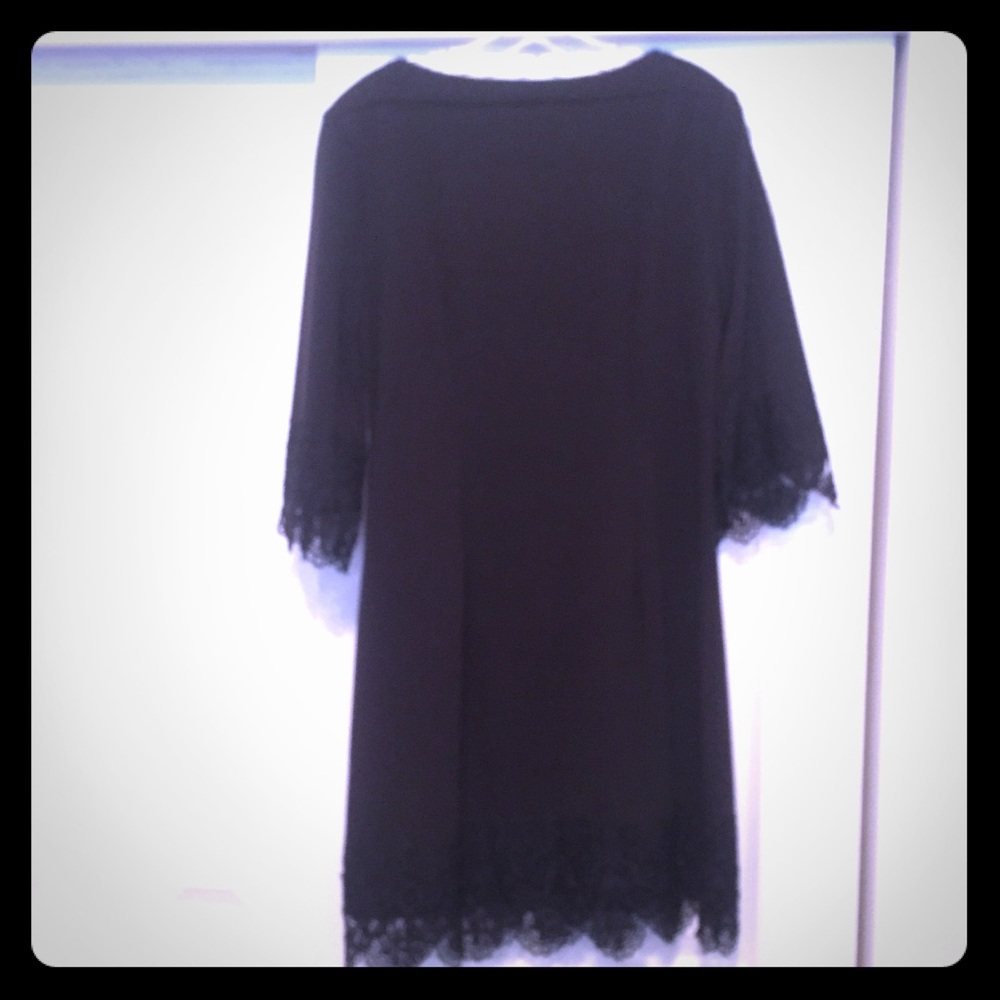 Super chic black dress with lace details.